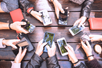 smartphones in hand scrolling.png